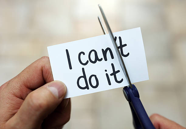 Motivational image showing 'I Can't Do It' with the 'T' being crossed out, turning it into 'I Can Do It' with a bell symbolizing transformation