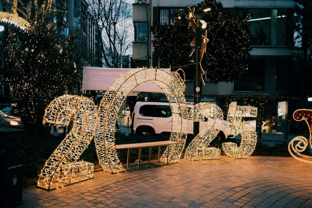 A beautifully designed graphic of the year 2025, showcasing vibrant colors and creative typography to symbolize hope and new beginnings.